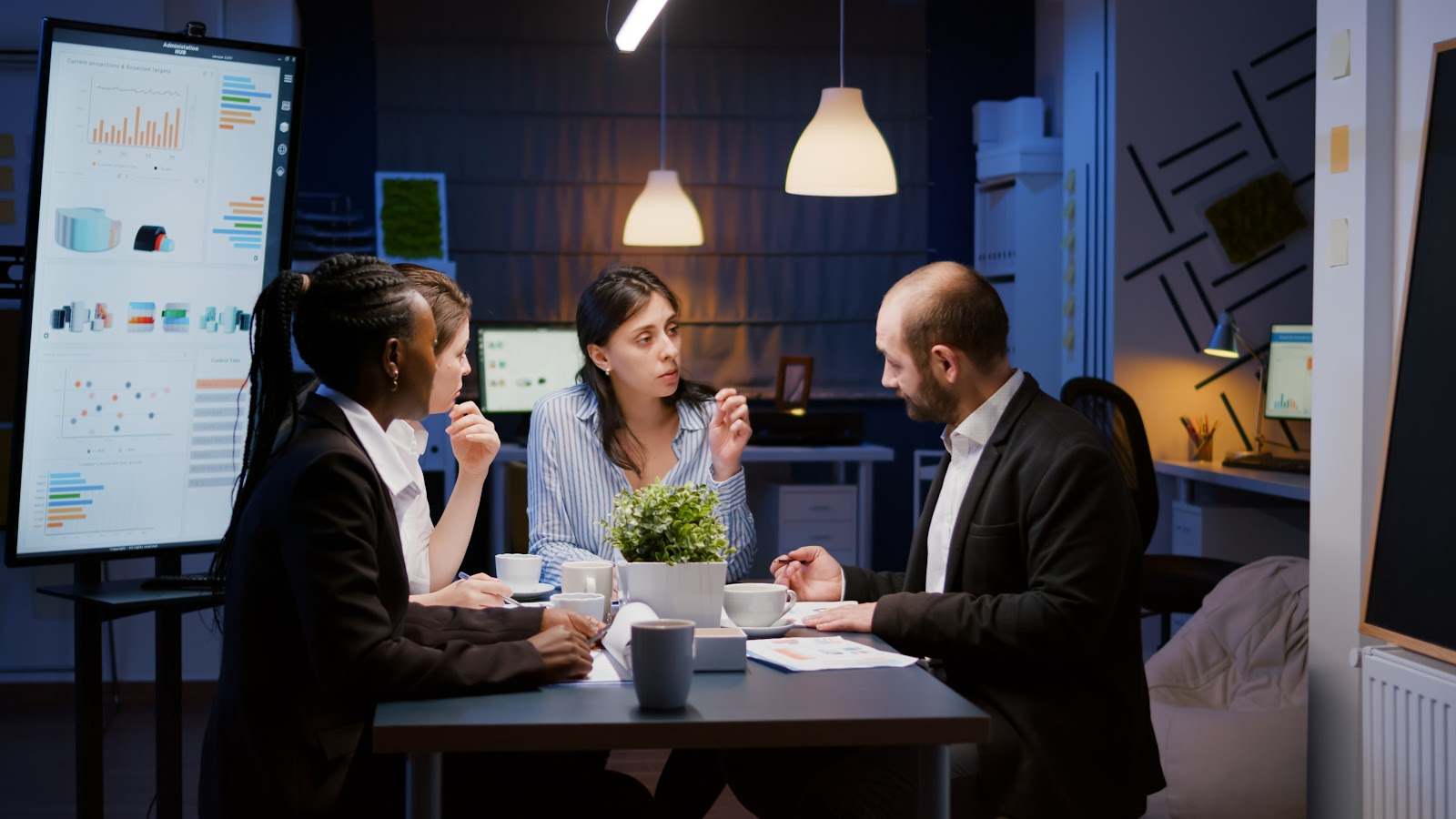 employees discussing in a meeting