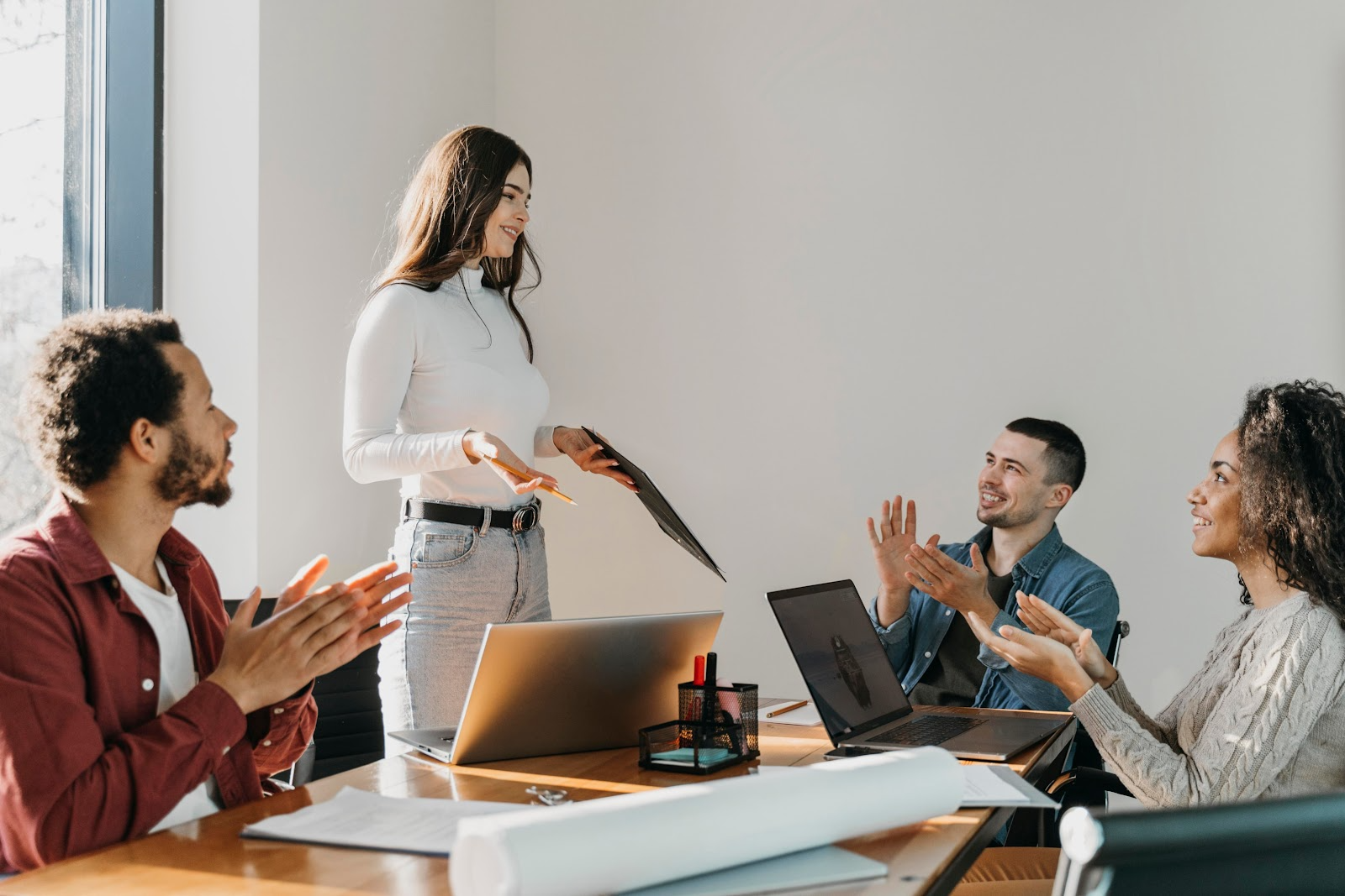 employees talking in an office