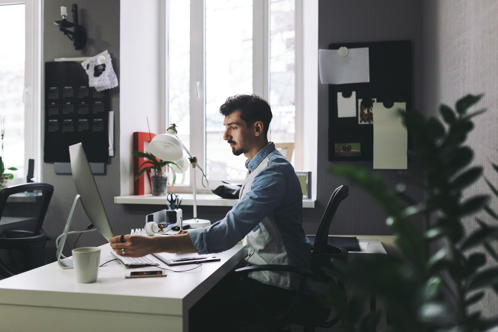 man sitting at a desk