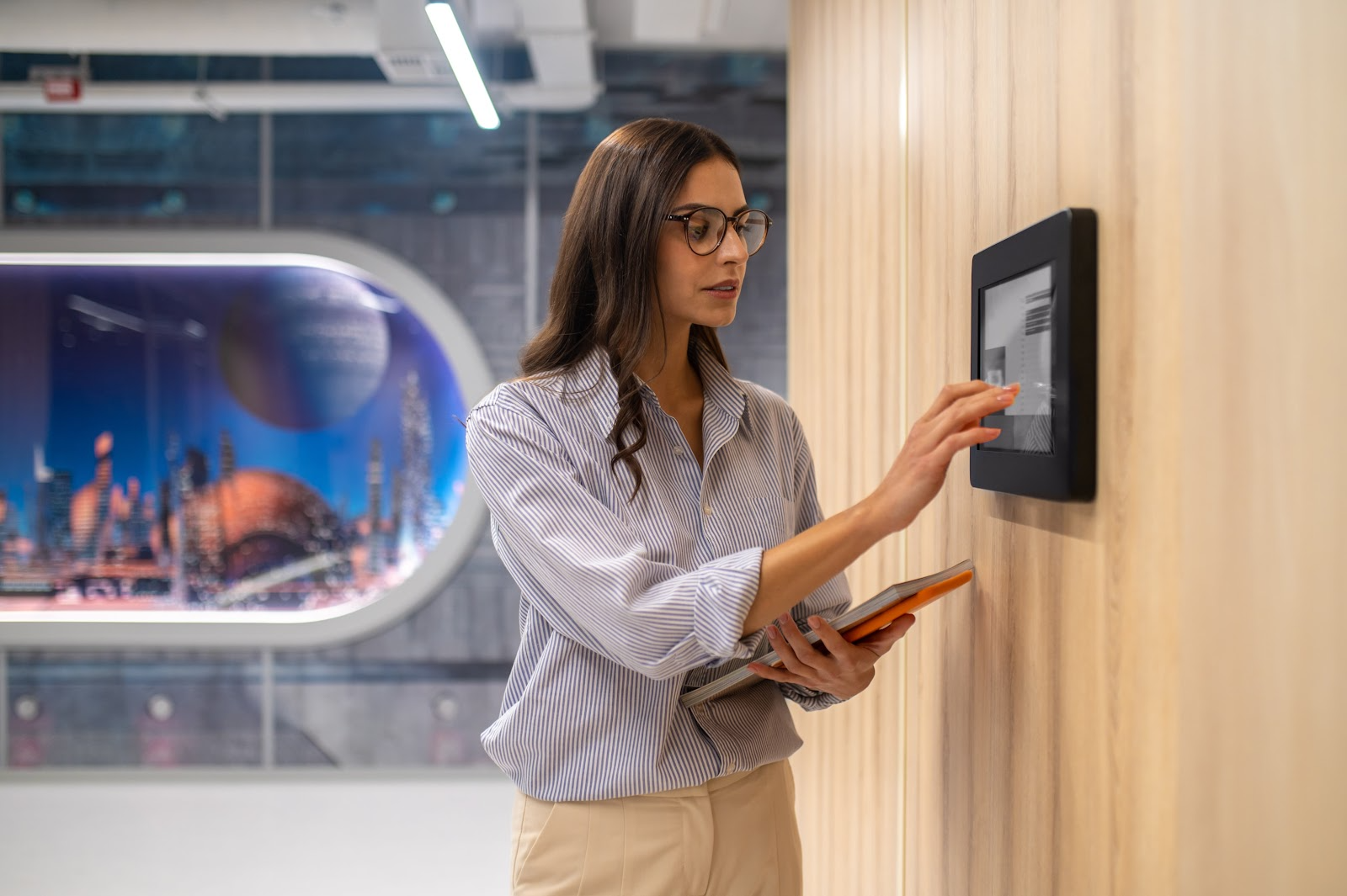 woman using a screen in an office